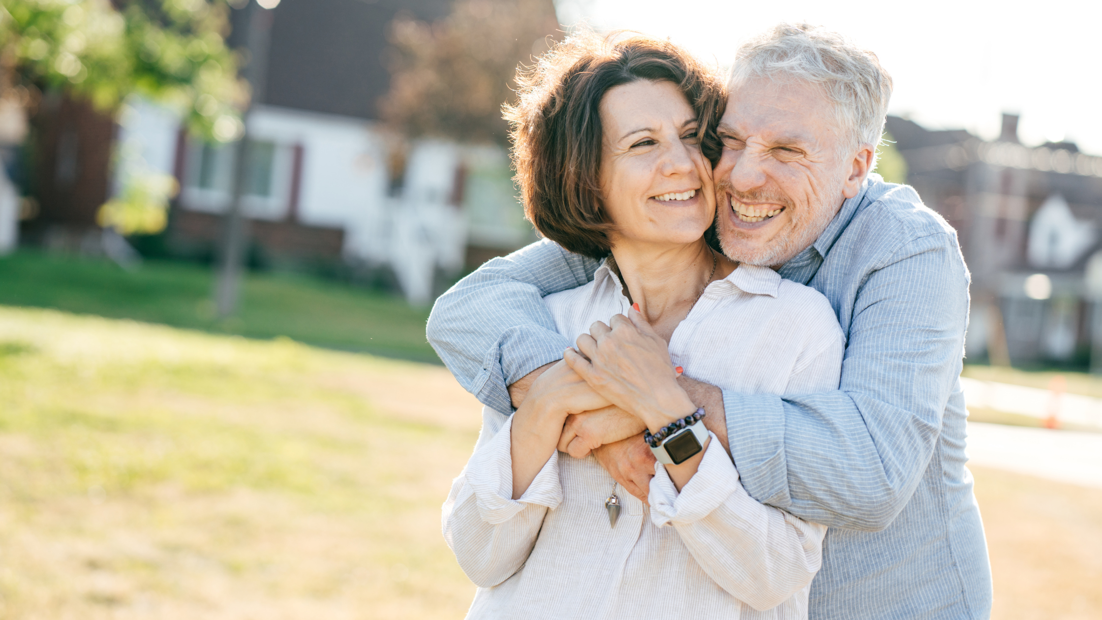 Retired couple embracing